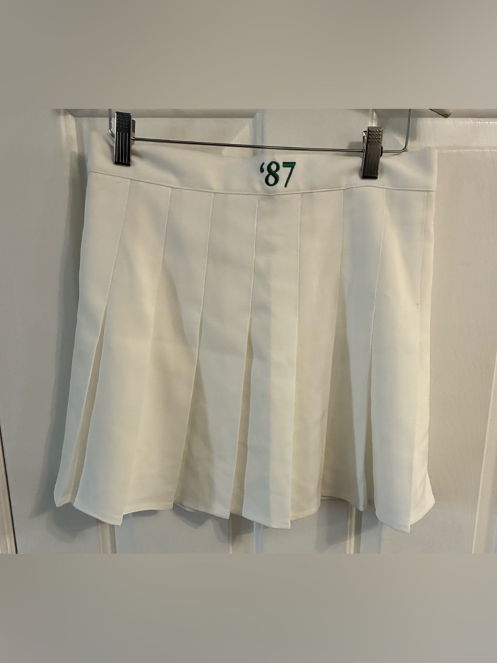 White Pleated Tennis Skirt with '87 Detail
